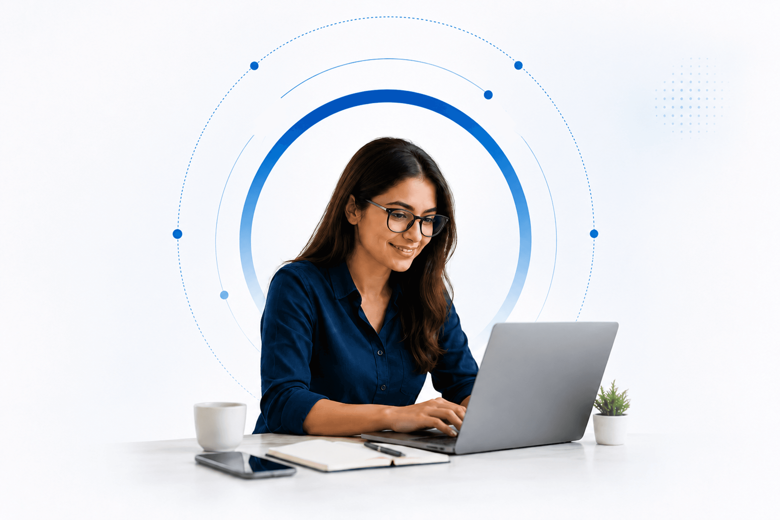 Nelgates Technologies team member working on a laptop